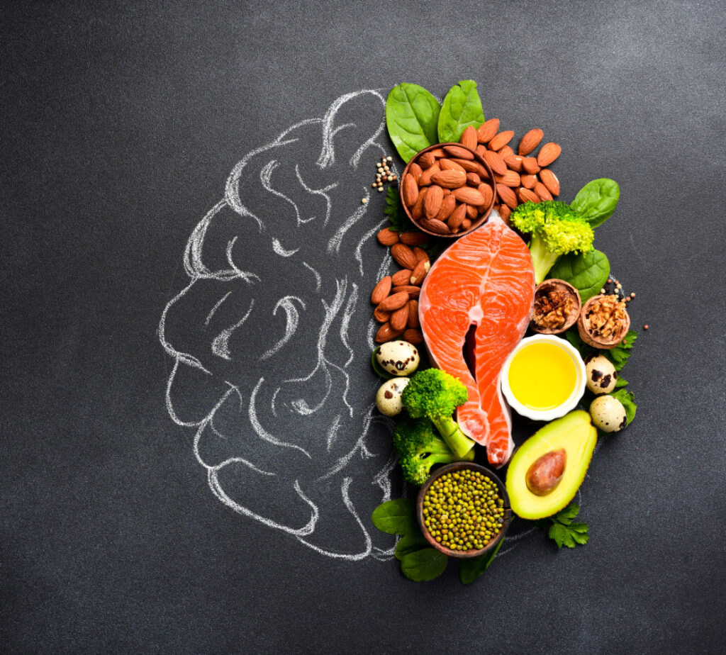 A picture of healthy eating hypnosis food. Fish, meat, nuts, vegetables and greens, high protein low calorie foods. How to get slim through a high protein diet for weight loss.