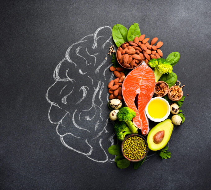 A picture of healthy eating hypnosis food. Fish, meat, nuts, vegetables and greens, high protein low calorie foods. How to get slim through a high protein diet for weight loss.